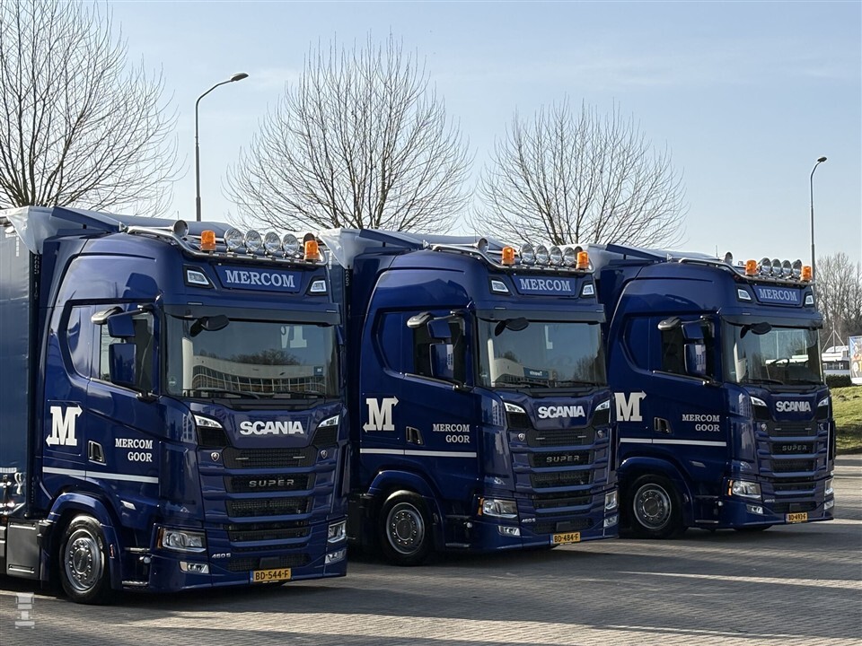 Mercom gaat lager met Scania